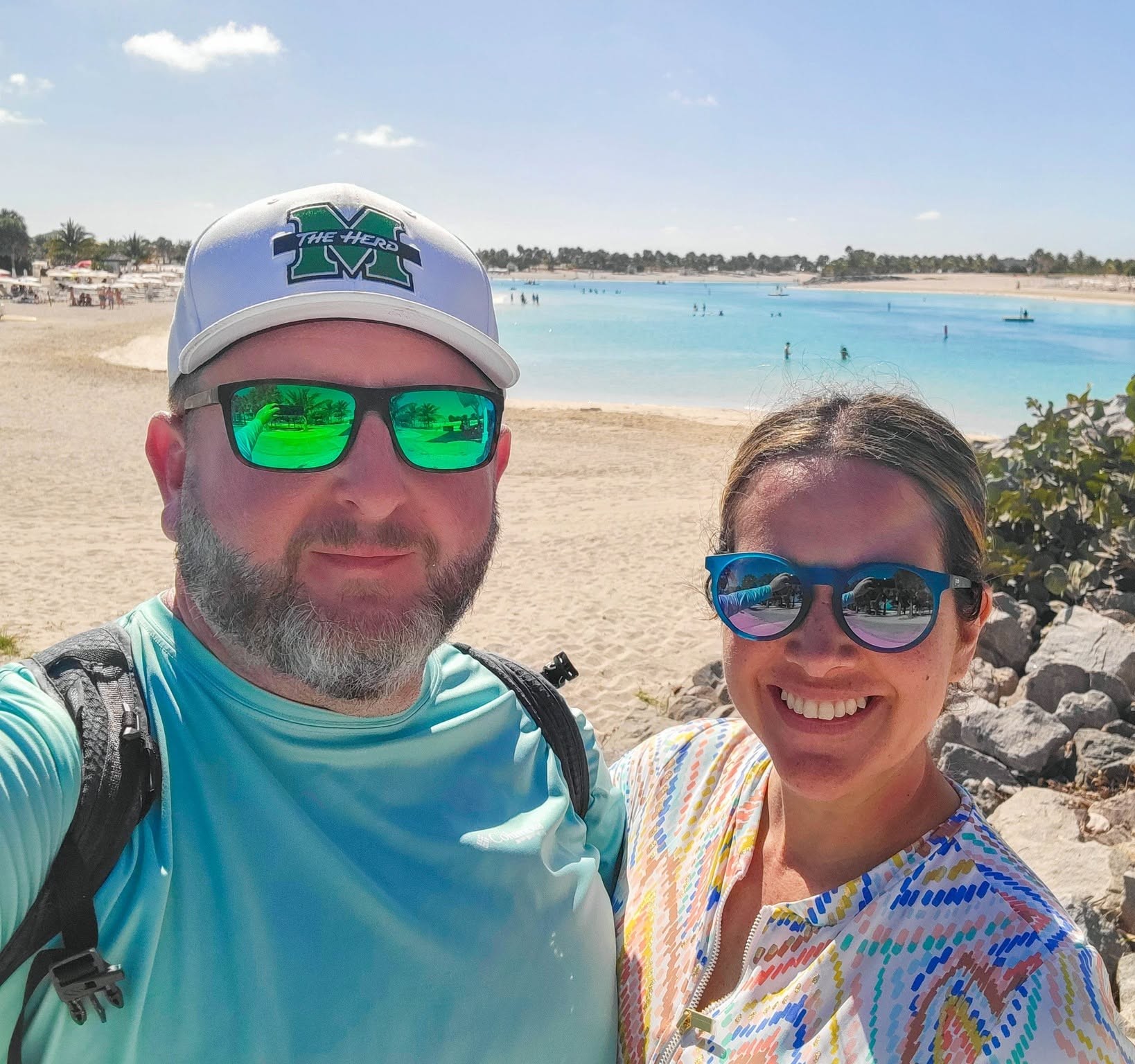 Couple taking a selfie on the beach
